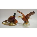 A Beswick pheasant model group,