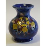 A contemporary Moorcroft Hibiscus pattern ovoid vase, 7.