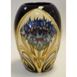 A contemporary Moorcroft Cornflower pattern ovoid vase, 14cm high,