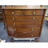 A Victorian mahogany bow fronted chest of two short above four long graduating cockbeaded drawers,