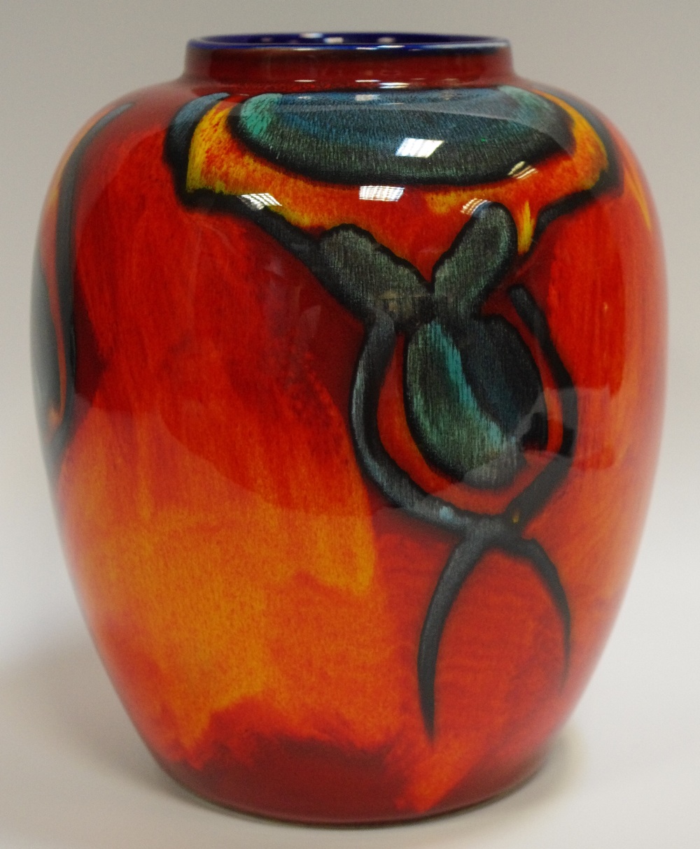 A Poole pottery ovoid vase, red, orange, blue glazed,