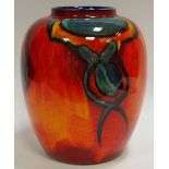 A Poole pottery ovoid vase, red, orange, blue glazed,