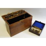A Victorian box holding a quantity of 19th century and later keys including clock keys, winders etc.