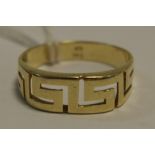 A continental 14ct gold ring with Greek Key border 3.