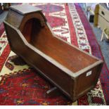A late 19th/early 20th century pitch pine cradle, c.