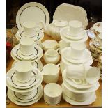 Ceramics - a Shelley Dainty White tea service to include seven cups and saucers, eleven side plates,