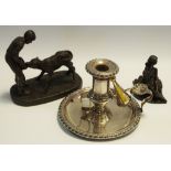 A small bronze figure of a seated ballet dancer;