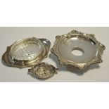 A Dutch silver quaiche; silver butter dish with glass liner; shaped circular silver base;