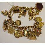 A 9ct gold charm bracelet, each link marked 9 & 375, 21 charms some hallmarked 9ct, others,