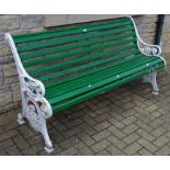 Garden Furniture - a cast iron and wooden bench,