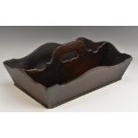 A George III mahogany rectangular knife tray, outswept serpentine borders,