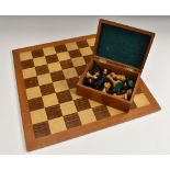 A boxwood and ebony Staunton pattern chess set, the Kings 7cm high,
