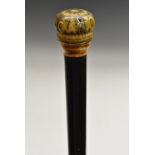 A Queen Anne ivory and silver pique walking stick handle, typically inlaid with pins and dated 1704,