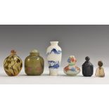 A Chinese inside painted glass ovoid snuff bottle, painted with boys in a landscape,