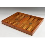 A 19th century mahogany games box, hinged cover inlaid for chess, enclosing a backgammon board,
