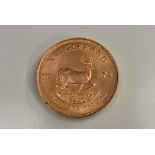 A 1974 Krugerrand gold coin,