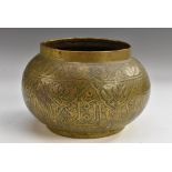 A Middle Eastern brass bowl,