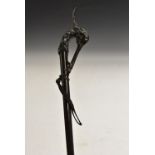 A 19th century dark patinated bronze mounted walking stick,