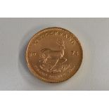 A 1974 Krugerrand gold coin,