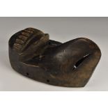 Tribal Art - an African mask, possibly Baga, carved as a stylised bird, 23cm long,