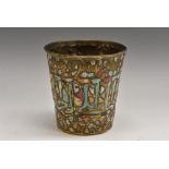 A Middle Eastern gilt copper and enamel tapered cylindrical vessel,
