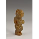 A hardstone amulet, carved as a stylised female figure,