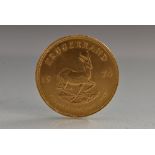 A 1974 Krugerrand gold coin,