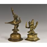 A 19th century Indian bronze shrine figure, cast as Garuda, domed base, 17.