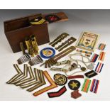 Militaria - WWI and later, including ribbons, shells, whistles, stripes, badges, etc.