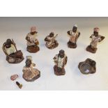 A collection of African painted terracotta figures,