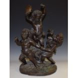 French School, a substantial dark patinated bronze, of revelling Bacchic putti, traces of verdigris,