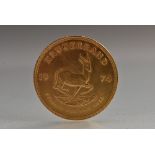 A 1974 Krugerrand gold coin,