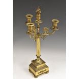 A 19th century gilt brass three-light candelabrum, in the Empire taste, campana sconces,