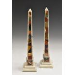 A pair of pietra dura obelisks, inlaid with lapis lazuli, malachite and other specimen stones,
