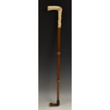 A 19th century riding crop, bone L-shaped handle, bamboo shaft,