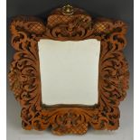 A 19th century shaped rectangular looking glass,
