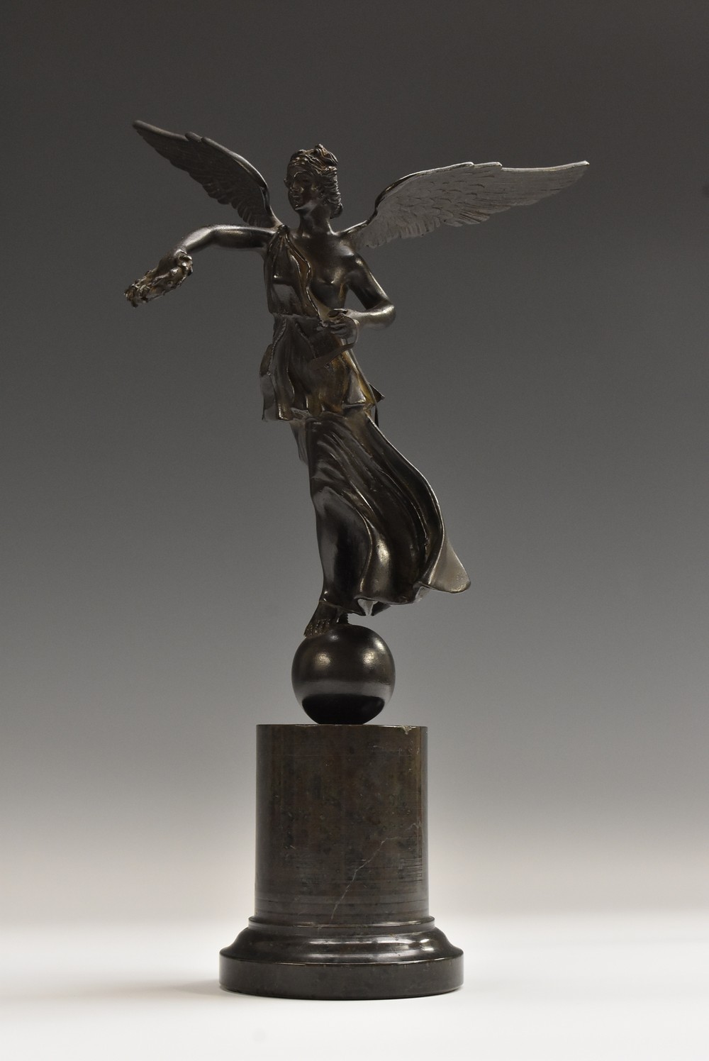 Italian Grand Tour School (19th century), Winged Victory, globular socle, serpentine base,