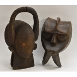 Tribal Art - a Chamba bovid mask, of stylised geometric form, curved horn cresting,