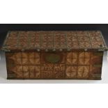 A Colonial hardwood rectangular chest, hinged cover carved with rows of stylized lotus,