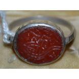 An Islamic carnelian set silver ring