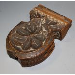 A 19th century Black Forest carved wood pocket watch case