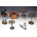 A 19th century cast iron office stamp stand; others similar;