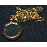 A 9ct rose gold mounted swivel fob pendant, plain bloodstone and carnelian matrixes,