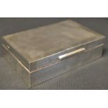 A silver cigarette box, 14cm long,