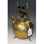 An Aesthetic Movement brass kettle,