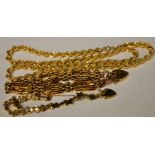 A 9ct gold rope twist necklace, an Edwardian triple row 9ct gold gate bracelet,