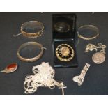 Jewellery - a silver hinge bangle; others, silver locket pendant necklace,