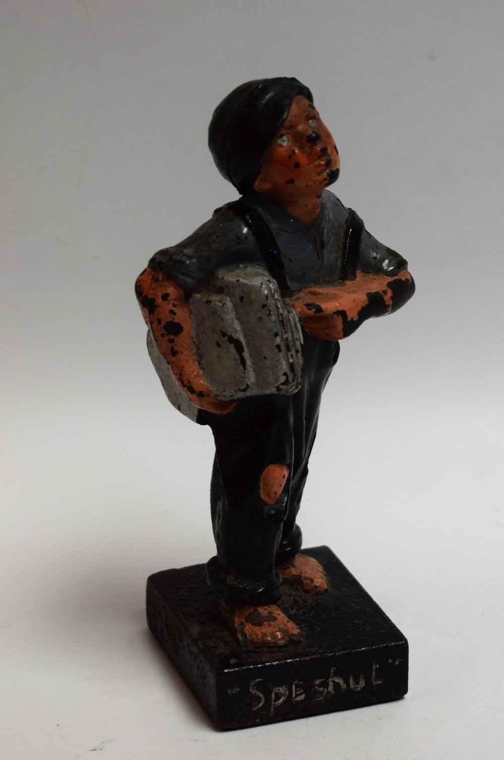 Advertising - Qualcast - a painted cast iron figure of a newspaper boy, 'Speshul',