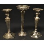 A pair of silver candlesticks, Birmingham 1937; a silver fluted vase,