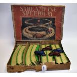 Toys and Juvenalia - a Louis Marx Streamline Speedway set, with four cars,